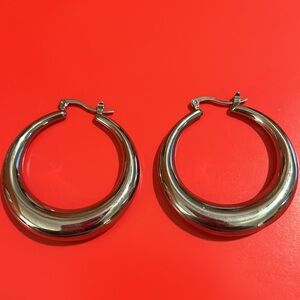 Stately Steel Graduated Puffed Hoop Earrings